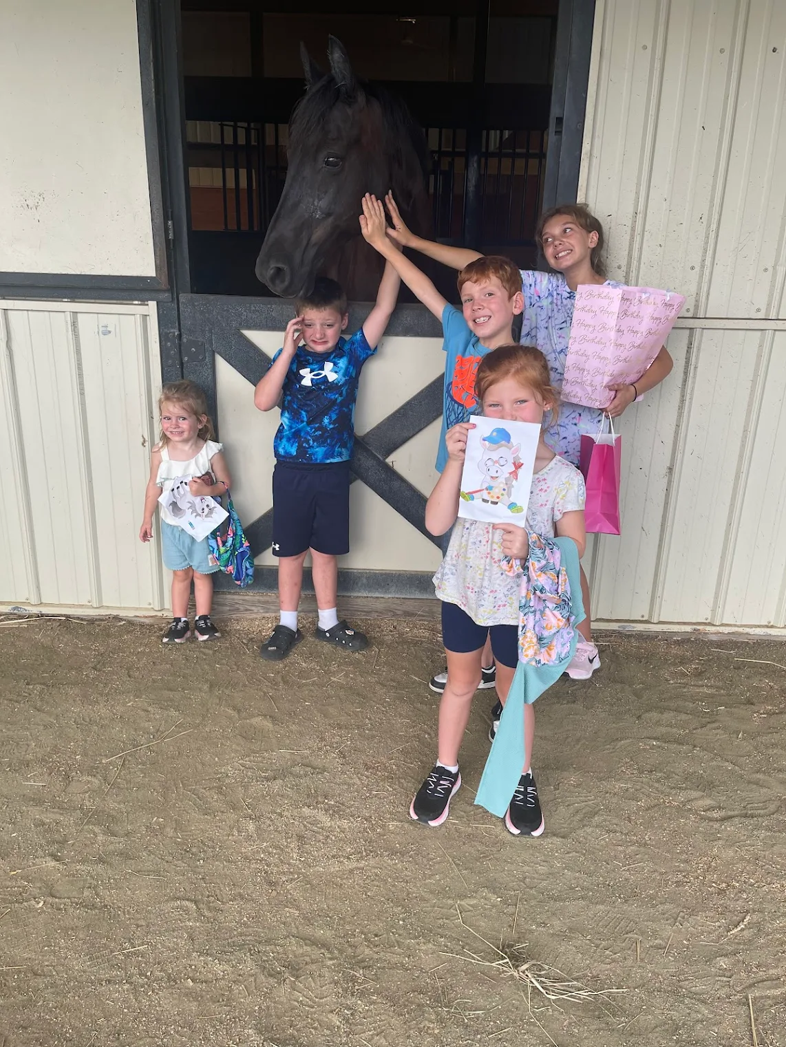 Birthday party group with a horse
